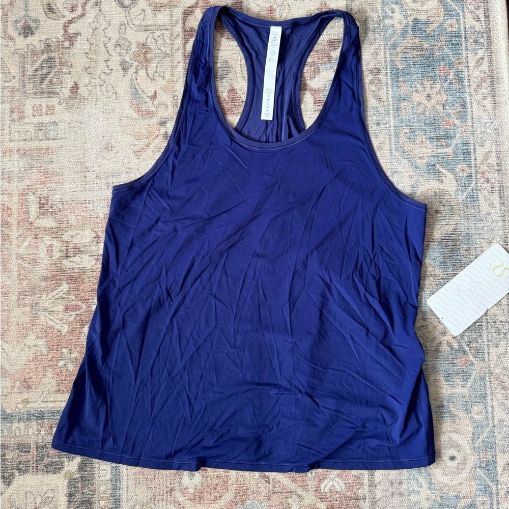 Lululemon navy tank with tie in back, size 10